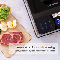 A top-down picture of a beef steak on a cutting board next to the Neovide machine.