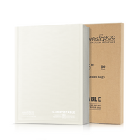 Stack of 1x16 inch compostable vacuum seal bags standing against the brown cardboard box.