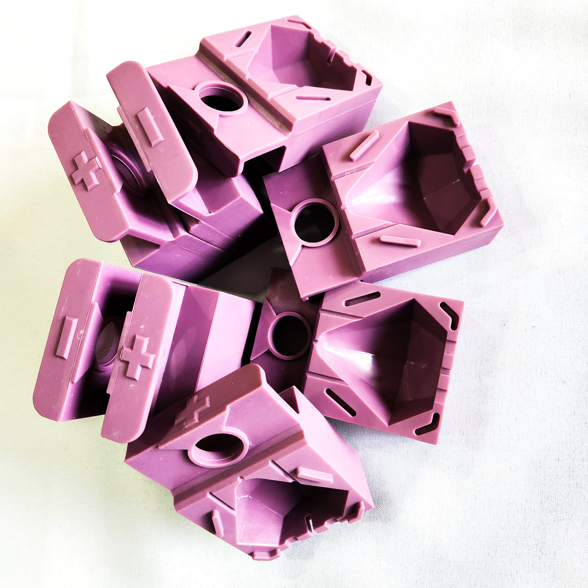 A picture of the pink silicone ice molds for the diamond shape.