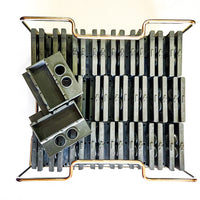 A picture of the dark grey Collins spear ice molds and the stainless steel frame.