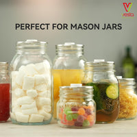 A picture of the sealer mason jars using the lids available with the Handheld Vac 'n Seal. 