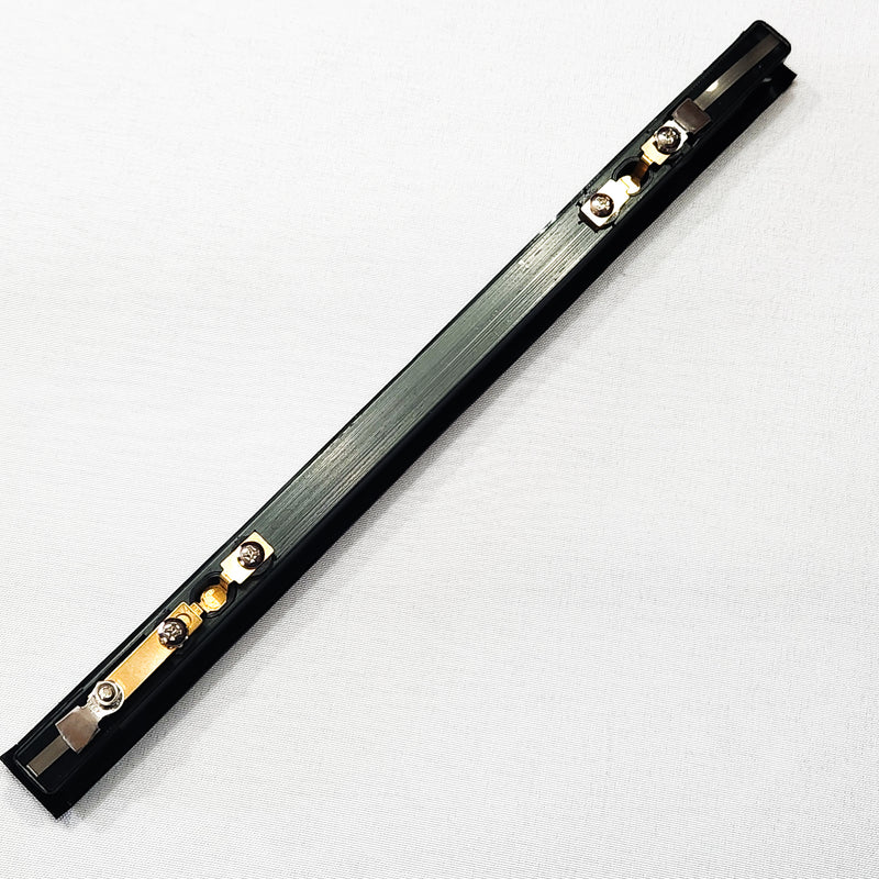 A picture of the seal bar for the V30 Chamber Vac Elite, a black thin rectangular bar with the brass contacts visible on the underside of the bar.