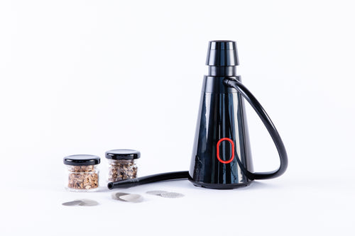 A picture of the SG10 Gusto smoke infuser with two small jars of wood chips and spare mesh.